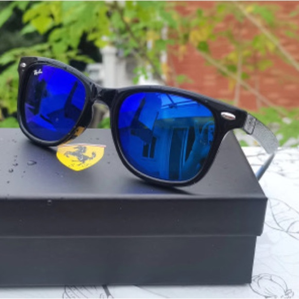 Ray-Ban Sunglasses with Black Frames and Blue Lenses